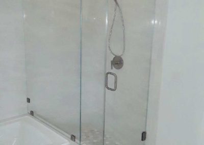 california frameless glass shower door installation in with marble walls 90 degree two panel