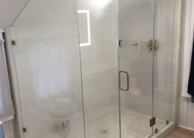 Custom angular cat california frameless glass shower door installation