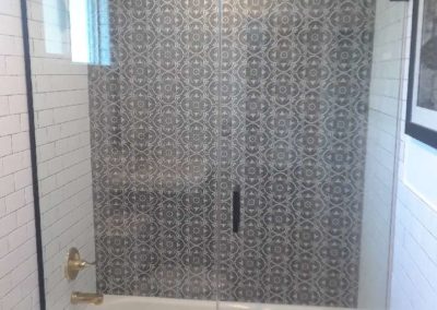 california frameless glass shower door installation in with bath tub